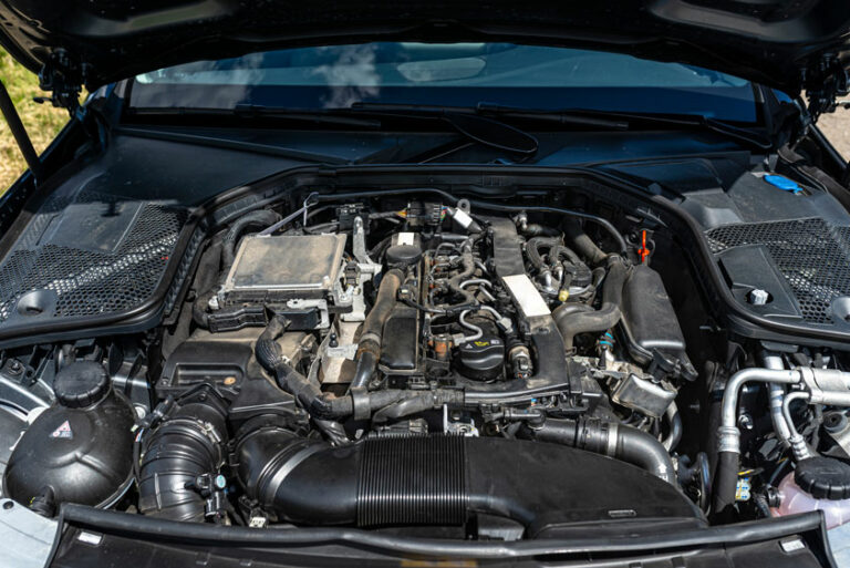 A modern diesel engine being inspected before having the adblue removed in Surrey Heath